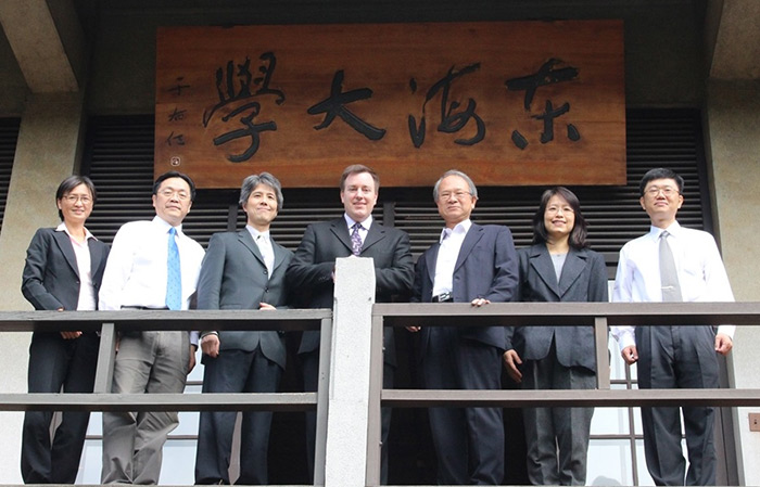 group photo of Academic Collaboration Agreement signed