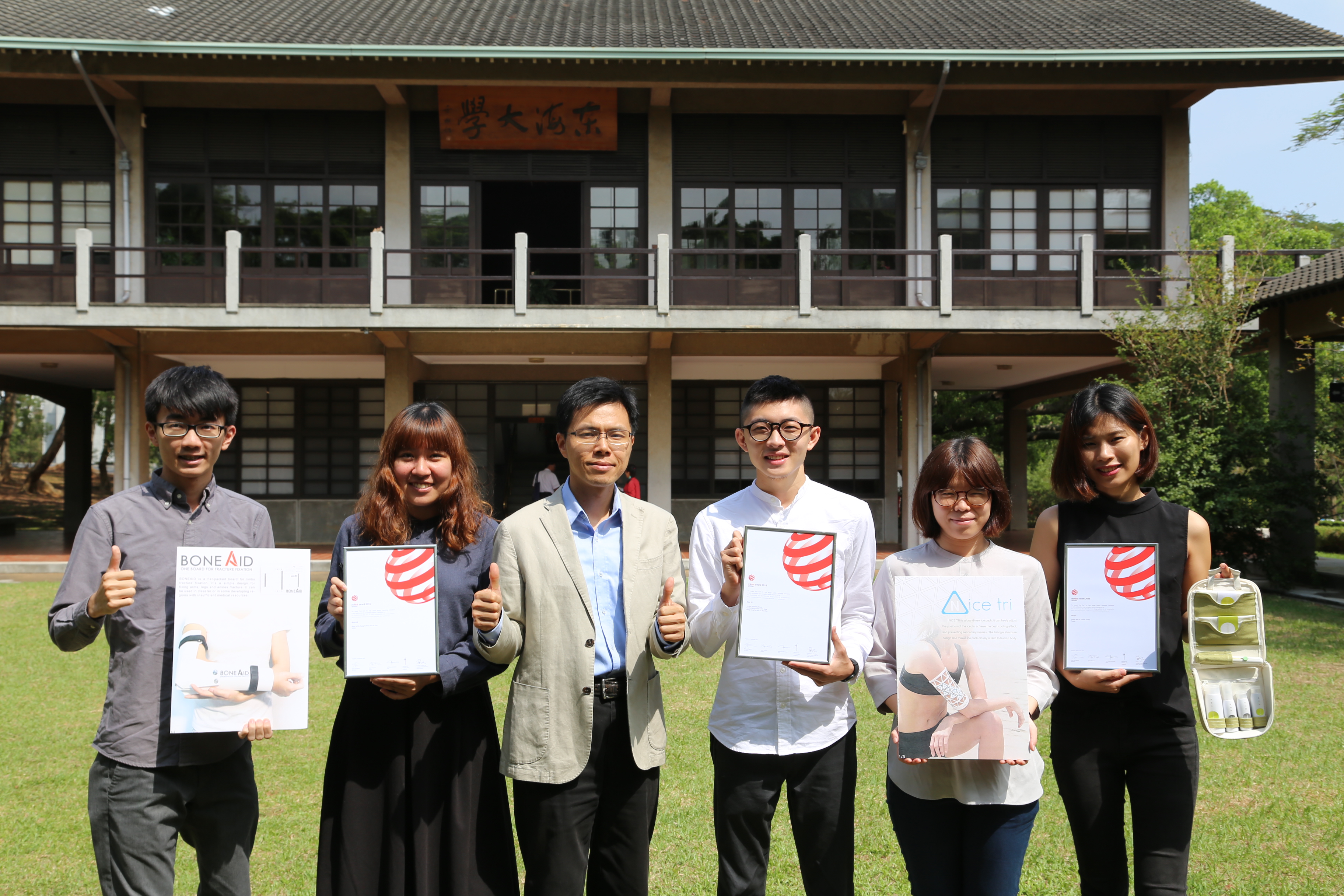 Students displayed their award-winning designs with the department Chair Dr. Yao-Tsung Ko